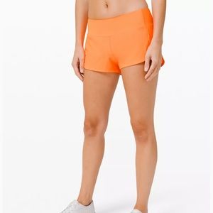 highlight orange 2.5” lululemon speed up short